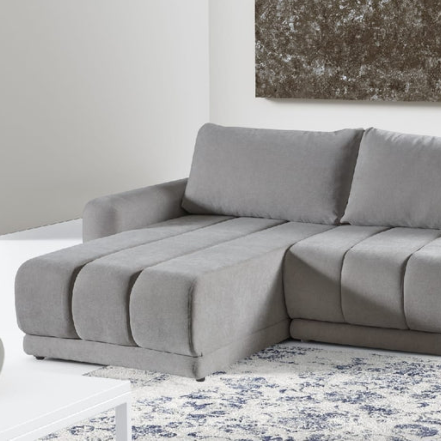 Canapé panoramique convertible Gris avec lit intégré et finitions haut de gamme